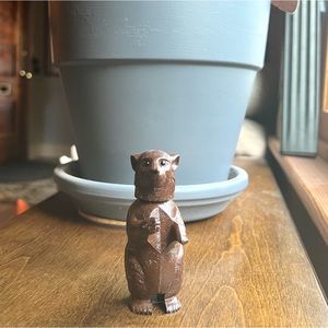 Cute bobble head bear figure.
